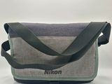 a close up of a camera bag on a white background