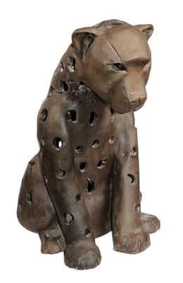 statue of a cat with holes cut out of it ' s body
