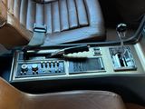 an image of a car dashboard with leather seats and a radio