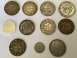 a close up of a bunch of coins sitting on top of a table