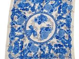 a blue and white handkerchief with flowers on it