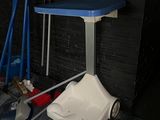 a toilet that is sitting in the corner of a room