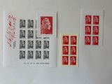 a picture of a collection of stamps on a white surface