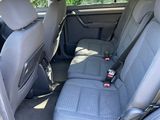a picture of a car with the back seats folded down