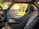 a view of the inside of a car from the driver ' s seat