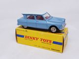a blue toy car sitting on top of a yellow box