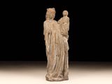 an image of a statue of a woman holding a child
