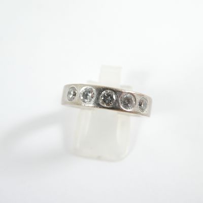 an image of a three stone ring on a white background