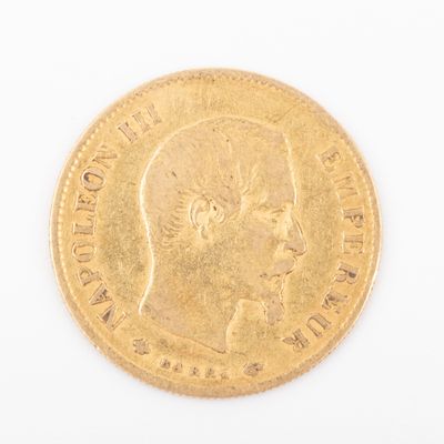 an image of a gold coin with a man ' s face on it