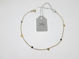 a close up of a bracelet with a price tag on it
