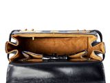 leather handbag with handle and strap on white background
