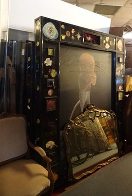 a large picture of a man holding a purse in a room