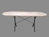 a white marble table with iron legs on a gray background