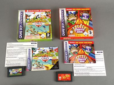 a game box with a game and several other items on it