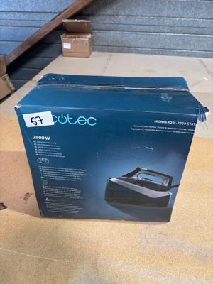 an open box of a printer sitting on top of a table