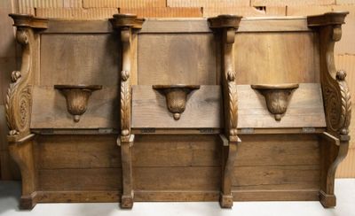 three wooden shelves with vases on them in a room