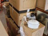several boxes stacked on top of each other in a room