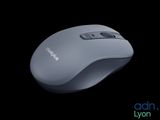 a computer mouse that is sitting on a black surface