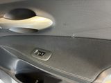 a close up of a door handle in a car