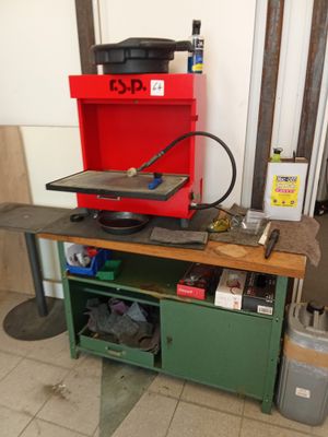 an image of a workbench with tools on top of it