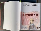 an open book with a drawing of a man on it