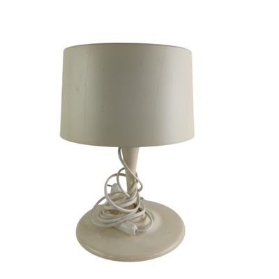 a white lamp with a white shade on it