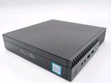 a close up of a small black computer on a white surface