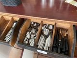 many spoons and spoon spoons in a drawer