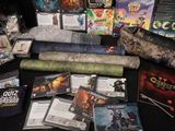 a lot of video games and games on the table