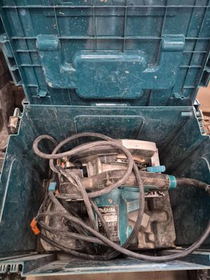 a blue tool box with tools inside of it
