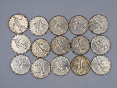 a close up of a bunch of coins sitting on top of a table