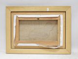 an old picture frame with a piece of paper taped to it