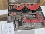 a box with tools on a table in a room