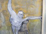 un tableau représentant un homme tenant une batte à la main