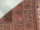 an area rug with a triangle on top of it