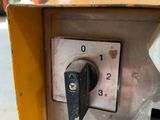 a close up of a machine with a clock on it ' s face