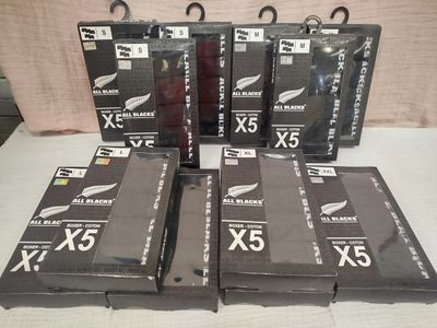 six boxes of new zealand x5 boxes are sitting on a table