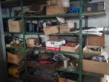 many boxes and boxes on the shelves in the garage