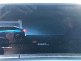 someone is taking a picture of a car with the rear view mirror