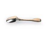 spoon and spoon rest on a white surface with a white background
