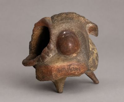an image of a sculpture of a fish with its mouth open