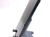 a cell phone that is sitting on top of a stand