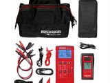 a close up of a red and black bag with a digital multimeter