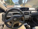 dashboard view of a car with a steering wheel and dashboard controls