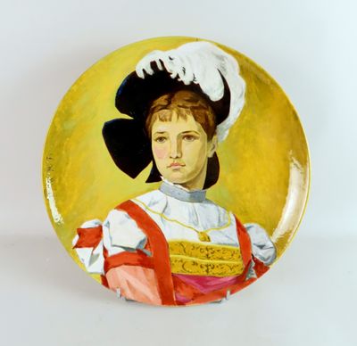 Félix OPTAT MILET (1838-1911). Plat en faïence à décor polyc…