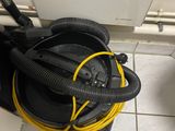 a vacuum cleaner that is sitting on the floor