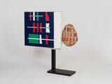 an image of a sculpture of a piece of art on a stand