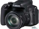the canon sx is a compact camera with a wide angle lens
