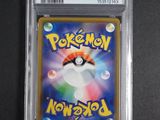 a close up of a pokemon card in a plastic case