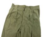 an image of a pair of green pants on a white background